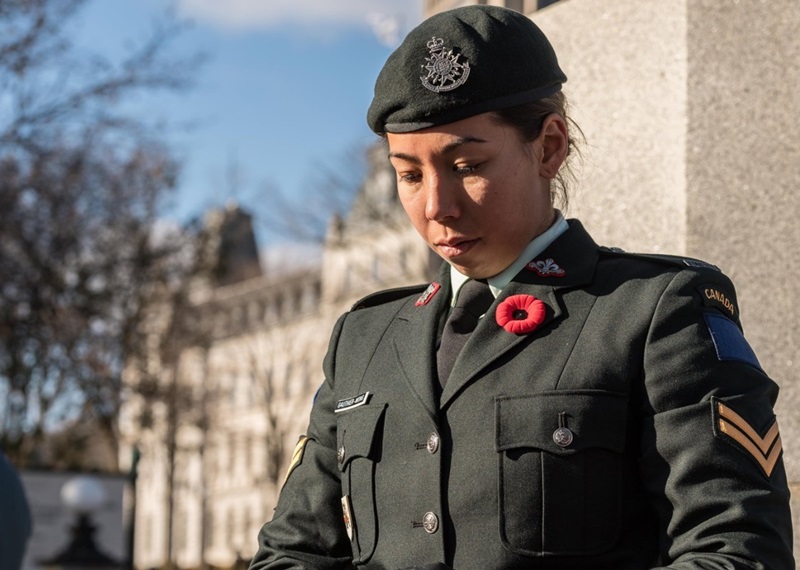 A Canadian Armed Forces member stands sentry during a Remembrance Day ceremony