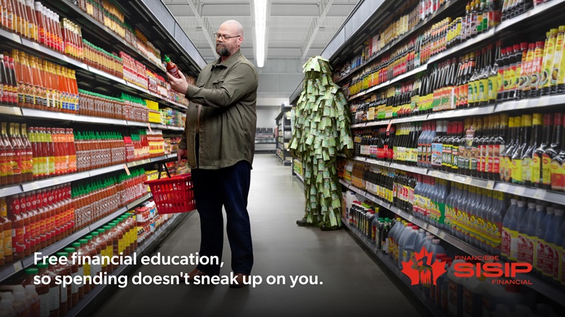 A person reads a product label in a grocery store aisle while another figure dressed in a suit made of paper resembling receipts stands behind them, with financial education text and the SISIP Financial logo overlaid.