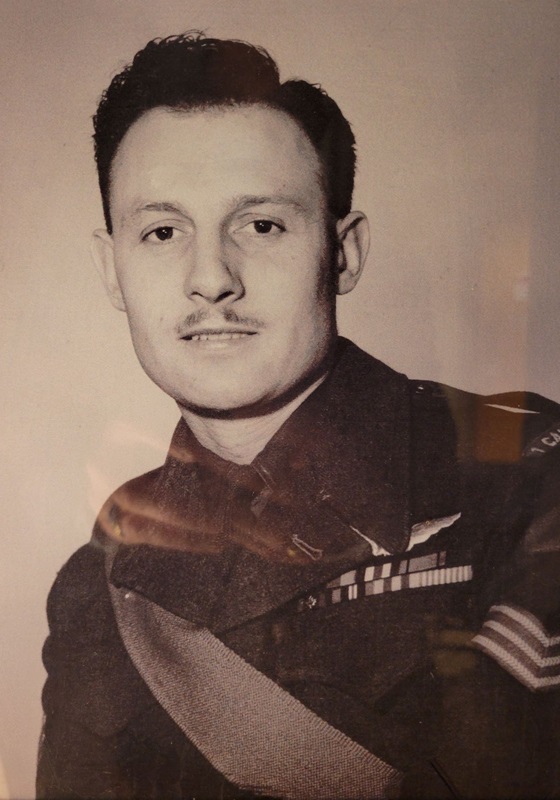 Old black and white profile picture of Sgt (Ret'd) Lloyd Alexander John Wesley Douglas in uniform smiling.