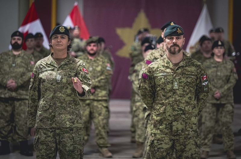 5th Canadian Division Training Centre (5 CDTC) Commanding Officer, Lieutenant-Colonel Bryan Ouellet (right) and the 5 CDTC Sergeant Major, Chief Warrant Officer Lizette LeBlanc stand on parade during the Army Training Centre