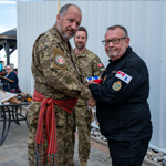 From left to right: MCpl Thomas Timmerman and CPO 1 Chris McBride, Station Chief Warrant Officer. In background: LCol Hans La Pierre, Commanding officer CFS Leitrim.