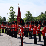 Members of the Ceremonial Guard stand in formation at the National Military Cemetery during the 25th anniversary commemorative ceremony.