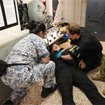 Photo by Emily Casavant Commander, U.S. 3rd Fleet
Multinational service members participate in mass casualty medical training held aboard HMCS Ottawa during RIMPAC 2026 June 30, 2026.