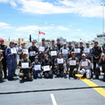 Military members from participating partner nations and instructors pose for a photograph with certificates of completion following a Canadian-led tactical combat casualty care course aboard the Royal Canadian Navy Halifax-class frigate HMCS Ottawa (FFH 341) at Joint Base Pearl Harbor-Hickam, Hawaii, during Exercise Rim of the Pacific 2026, June 30, 2026.
Photo by Petty Officer 1st Class Lanie Locson Commander, U.S. 3rd Fleet