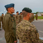 1 Cdn Div HQ members, Lieutenant-Colonel Hoddinott and Master Warrant Officer Turcotte, assist with the rebadging ceremony for the newly named Canadian Joint Response Force HQ.