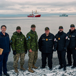 From left to right, Commanding Officer Kevin R. Jones of the Canadian Coast Guard Ship (CCGS) Henry Larsen, Chief Warrant Officer James Bull, Land Task Force Sergeant Major. Lieutenant-Colonel Christopher Van Den Berg, Land Task Force Commander, Commander Brian Henwood, Commanding Officer of His Majesty’s Canadian Ship (HMCS) Robert Hampton Gray, Lieutenant-Commander Jeffrey Woodhouse, a Chief Petty Officer 2nd Class from HMCS Robert Hampton Gray, and Chief Petty Officer 2nd Class Ivan Lightwood pose for a group photo in front of the CCGS Henry Larsen and HMCS Robert Hampton Gray in Resolute Bay, Nunavut, on September 11, to recognize the achievements of all teams working together towards mission success during Operation NANOOK-NUNAKPUT. Photo: Corporal Gwyneth Lovell