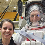 Captain Erin Edwards and RCAF Col/Canadian Astronaut Josh Kutryk pose for a photo at the Neutral Buoyancy Lab prior to his Extra Vehicular Activity (EVA) training dive. Photo provided by Captain Edwards.