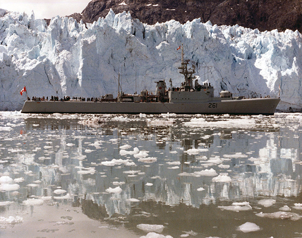 A ship travels across icy waters.