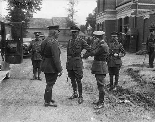 General Sir Sam Huges (left fore) visiting the Front