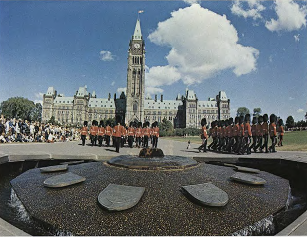 Soldiers parading in front of Parliament building.