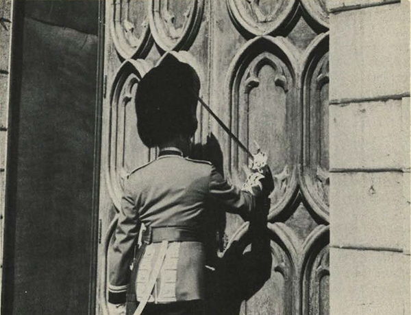 soldier knocking on a door.
