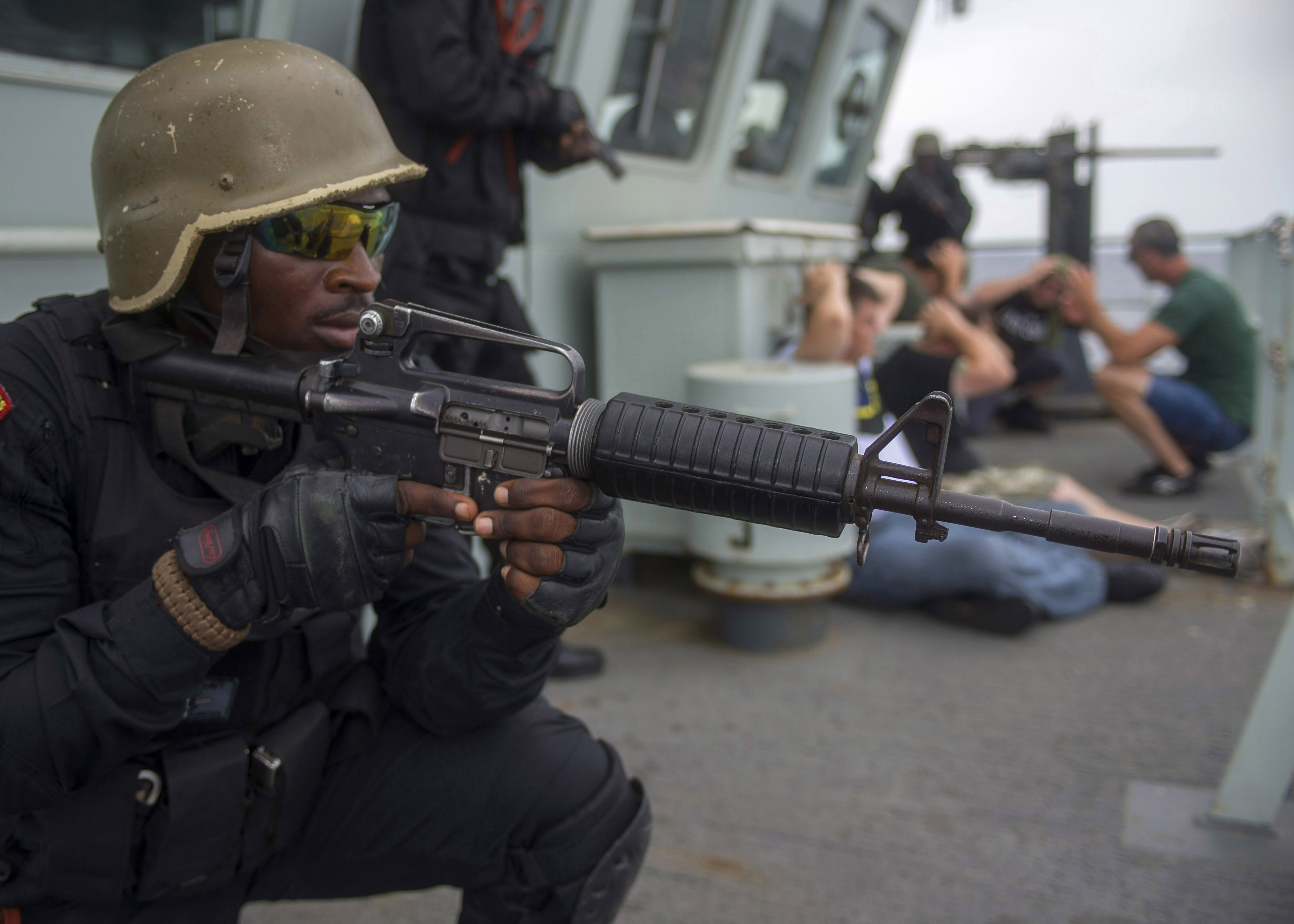 March 22, 2018. Members of Ghanaian Navy conduct boarding procedure exercises as Members of Her Majesty’s Canadian Ship KINGSTON perform as actors as part of Exercise OBANGAME EXPRESS, a joint Maritime exercise during Operation PROJECTION, off the coast of West Africa, March 22, 2018. Photo: Sgt Shilo Adamson, Canadian Forces Recruiting Group Headquarters, CFB Borden