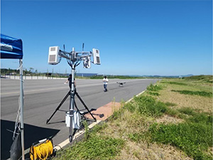 A counter-drone device on a road.