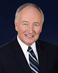 This image is a photograph of the Honourable Robert Nicholson, P.C., Q.C., M.P., Minister of National Defence