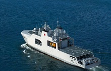 Rendering of the Harry DeWolf-class vessel - Aerial view port side aft at sea.