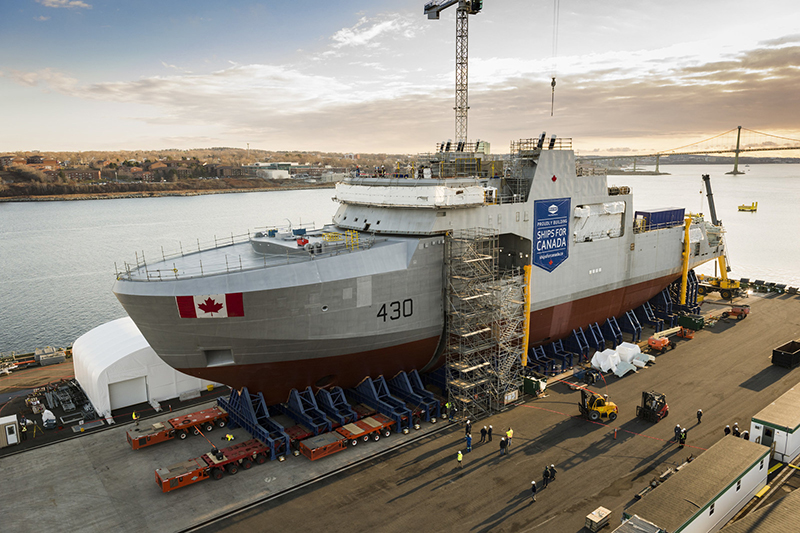 On December 8, 2017, the future HMCS Harry DeWolf’s third and final mega-block moved from inside the Halifax Shipyard’s Assembly and Ultra Hall facility to the exterior land level construction point, where it joined to the first two mega-blocks to form the complete vessel.