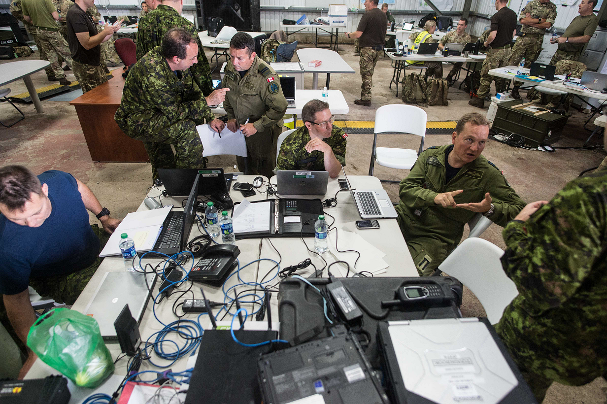 Members of the Royal Canadian Air Force and the British Royal Air Force conduct operations out of Operation RENAISSANCE Task Force Headquarters at Grantley-Adams International Airport, Barbados, September 17, 2017. Photo: Cpl Gary Calvé