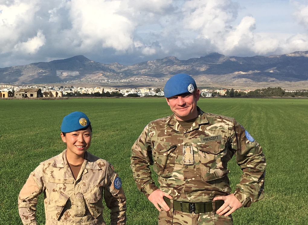 Captain Choi and a British officer pose for a photo on Operation SNOWGOOSE.