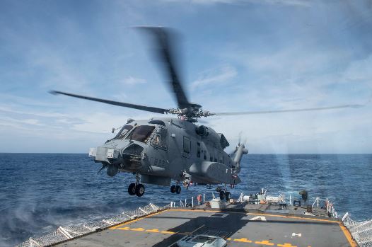 A CH-148 Cyclone helicopter takes off from HMCS Ville de Québec in the Atlantic Ocean during Operation REASSURANCE on 20 July 2018. (Photo: MCpl André Maillet, MARPAC Imaging Services)