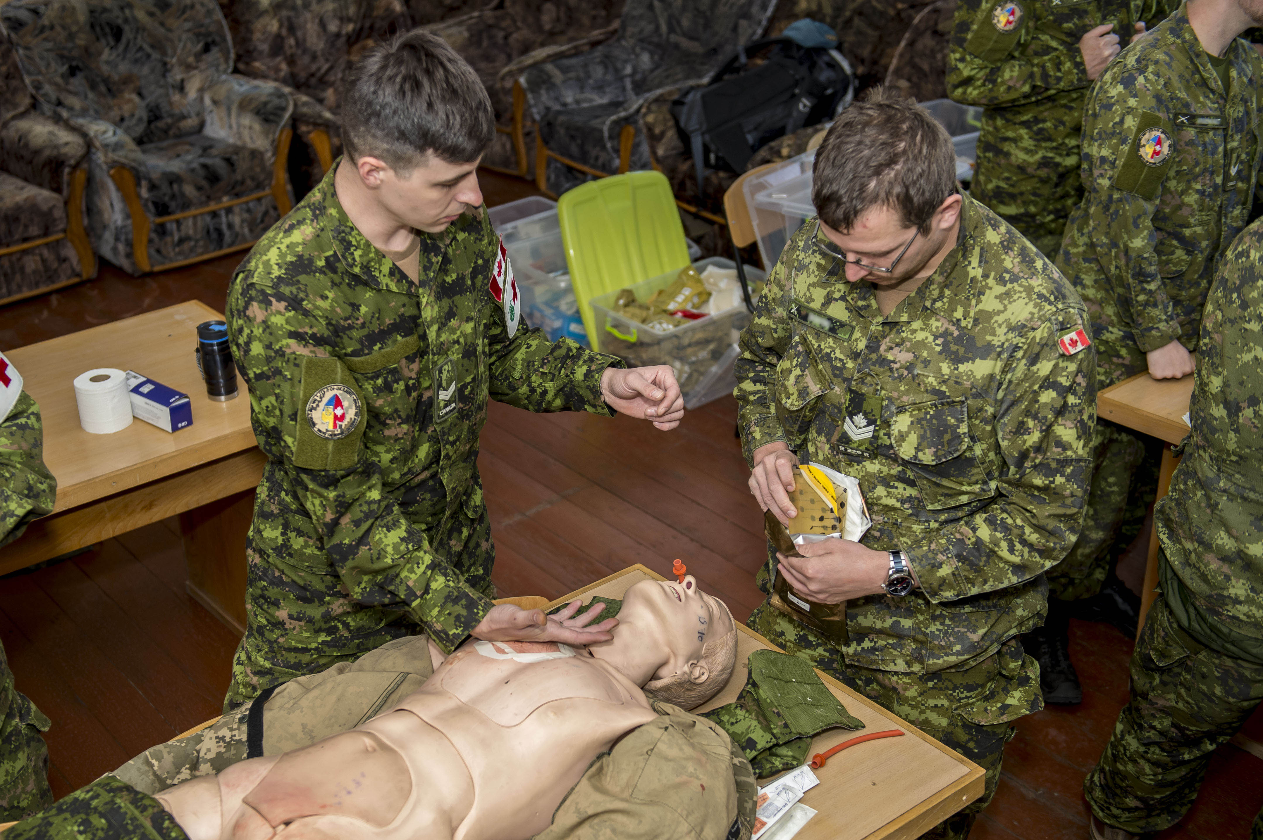 Photo has been digitally altered for operational security.  Members of Operation UNIFIER practice tactical combat casualty care skills at the International Peacekeeping Security Centre in Starychi, Ukraine on October 6, 2018. Photo: Joint Task Force-Ukraine 
