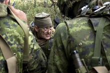 Maj. Chelsea Anne Braybrook, Commander of Bravo Company, 1st Battalion, Princess Patricia’s Canadian Light Infantry and a member of the enhanced Forward Presence Battlegroup in Latvia, briefs troops on plans and strategies during the NATO certification exercise at Camp Adazi, Latvia, August 24, 2017. Photo: MCpl Gerald Cormier RP12-2017-0083-019
