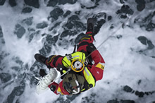 St.John’s, Newfoundland and Labrador. 21 March 2011 – Sergeant Dan Leger, Search and Rescue Technician, is hoisted out of the CH-149 Cormorant Helicopter during a 103 Squadron Search and Rescue Exercise. (photo by Corporal Jax Kennedy, Canadian Forces Combat Camera)