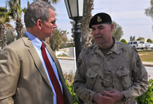 Mr. Brad Lynch, the Representative of the MFO Director General in Cairo in conversation with Rear-Admiral Peter Ellis, Deputy Commander CJOC, at MFO North Camp, Sinai, Egypt, on 23 March 2015. Photo credit: Sgt Tom Duval, U.S. Army