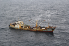 North Pacific Ocean. 22 May 2014 – A fishing vessel is sighted in the North Pacific Ocean May 22, 2014. The crew is suspected of three serious fisheries violations including: use of prohibited fishing gear of more than 3.3 kilometers of high seas drift net, failure to maintain sufficient records of catch and catch-related data, and fishing without a license, permit or authorization issued by a sanctioned authority. (U.S. Coast Guard photo by Coast Guard Cutter Morgenthau)