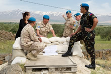 Camp Faouar, Golan Heights, 4 May 2012 – Members of the UNDOF and UNTSO confer at Camp Faouar (From left to right: Maj Islam Elkorazati, UNDOF Liaison Officer B-Side; Ms. Denaida Kapetanovic, UNDOF Civil Affairs Officer; Maj Chris Catry, UNDOF Military Advisor to the Force Commander; LCol Sean Nashrudi, UNTSO Chief Observer Group Golan; Maj Mario Gasser, UNDOF Liaison Officer A-Side; and LCol Godfrey Gammad, UNDOF Chief Liaison Officer, Philippines Armed Forces). (photo by: Canadian Armed Forces)