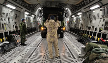 Évreux, France. 17 January 2013 - A Canadian Forces Loadmaster loads a French military fuel truck on to a Canadian Forces CC-177 Globemaster III in Évreux, France prior to being delivered to Bamako, Mali. (photo by Sergeant Matthew McGregor, Canadian Forces Combat Camera)