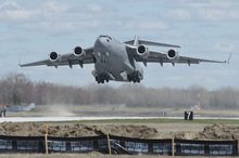 8 Wing Trenton. 28 April 2015 – A CC-177 Globemaster aircraft loaded with elements of the Disaster Assistance Response Team (DART) and personnel takes off from 8 Wing Trenton bound for Nepal on April 28, 2015. (Photo: Corporal Dan Strohan, 8 Wing Imaging)
