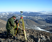 Master Corporal Corey Quinn and Corporal Mike Brajak from Canadian Forces Mapping and Charting Establishment Ottawa, Ontario mark boundary lines at the Grant High Arctic Data Communications System (HADCS) on June 11, 2016 during Operation NEVUS. (Photo: PO2 Belinda Groves, Task Force Imagery Technician)
