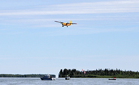 Northwest Territories. 7 July 2015 – A CC-138 Twin Otter Aircraft flies overhead, during Operation NUNAKPUT/Operation GATEWAY 2015. (Photo by PO2 Belinda Jeromchuk Joint Task Force (North) Public Affairs)