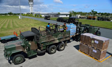 Members from Canadian Armed Forces Disaster Assistance Response Team (DART) and the Philippines Army load DART equipment on trucks during Operation RENAISSANCE, in Iloilo city, Philippines on November 16, 2013. IS2013-2006-010.jpg Photo : MCpl Marc-Andre Gaudreault, Canadian Forces Combat Camera
