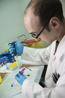 Sgt Sebastien Pellan, a Medical Laboratory Technologist with Joint Task Force Forward, tests blood samples provided by Syrian refugees during the medical screening portion of the Government of Canada’s Operation PROVISION in Beirut, Lebanon on December 9, 2015.  Photo: Corporal Darcy Lefebvre, Canadian Forces Combat Camera.