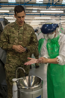Strensall, UK. 11 December 2014 – Canadian Armed Forces medical personnel learn proper hand washing procedures during Operation SIRONA pre-deployment training with their British counterparts at the Army Medical Services Training Centre in Strensall, UK. (Photo: Sgt Yannick Bedard Canadian Forces Combat Camera)