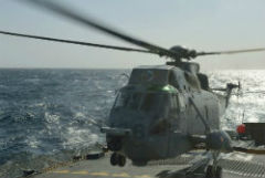 HMCS Regina’s CH-124 Sea King helicopter lands on the flight deck while in the Arabian Sea for Operation ARTEMIS on December 28, 2012. Photo: Corporal Rick Ayer, Formation Imaging Services, Halifax, Nova Scotia.