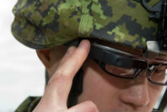 A Canadian Armed Forces soldier interacts with the tracking application on a Google Glass wearable heads up display.