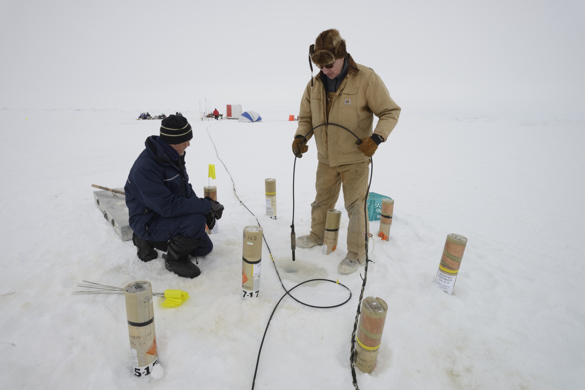 Hydrophones are put in the ice to monitor sound.
Photo by Janice Lang, DRDC