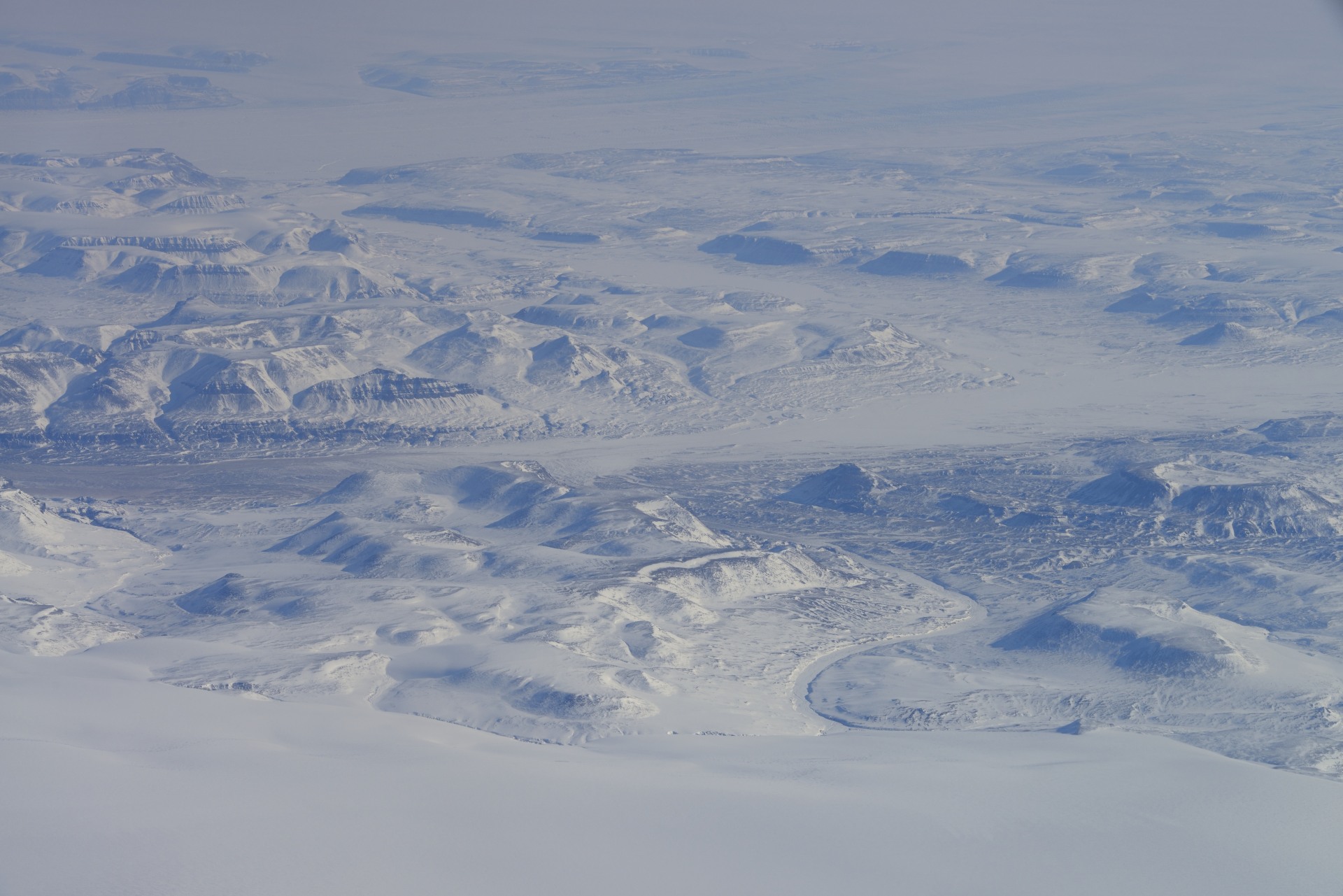Aerial view of Arctic landscape on northern Ellesmere Island, en route between CFS Alert and Thule, Greenland.  
Photo by Janice Lang, DRDC