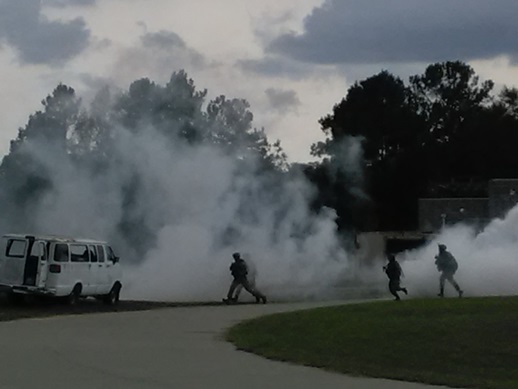 Soldiers on the assault through a smoke screen during the U.S. Joint Staff-led Exercise BOLD QUEST, a demonstration and assessment that took place from October 24 to November 3, 2016 in Fort Stewart, Georgia.