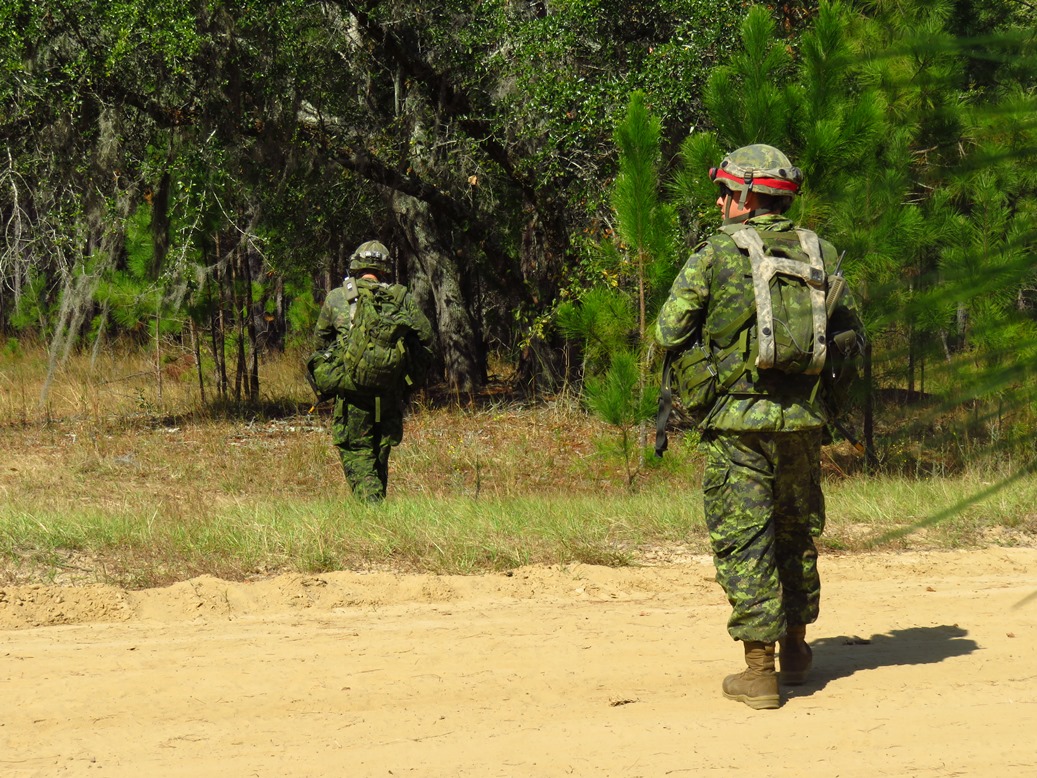 Soldiers advance to contact during the U.S. Joint Staff-led Exercise BOLD QUEST, a demonstration and assessment that took place from October 24 to November 3, 2016 in Fort Stewart, Georgia.
