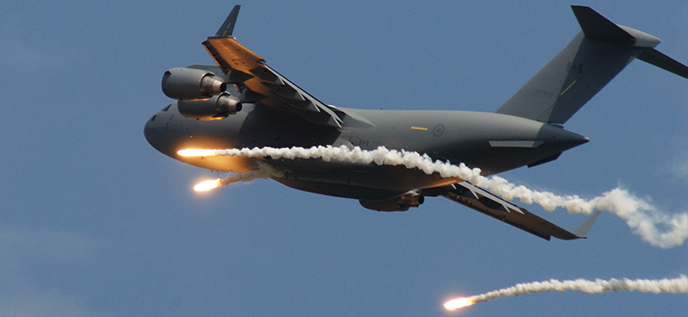 A CC-177 drops decoy flares during a trial campaign aimed at validating protection coverage.