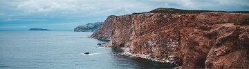 Rocky cliffs along the coastline.
