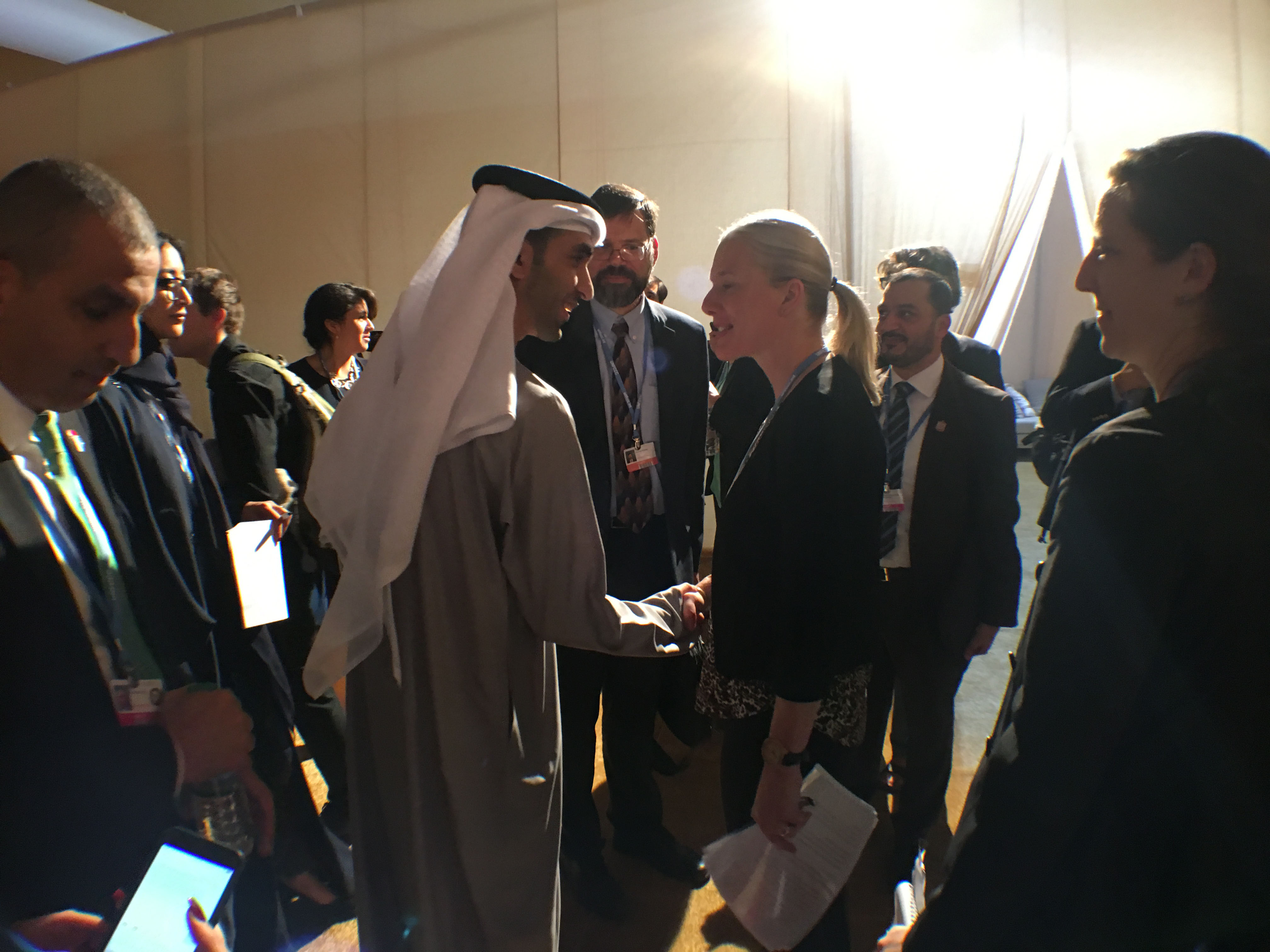 Minister McKenna is greeted at the UAE Youth Circle at COP22.