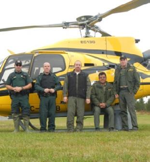 Wildlife officers and Ontario Ministry of Natural Resources conservation officers