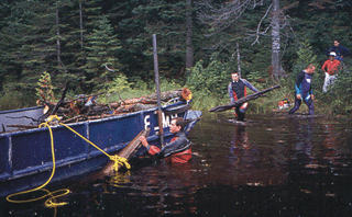 Figure 3: Removing wood from Quinn Lake