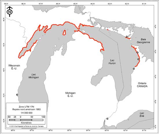 Figure 2. Répartition mondiale de l'iris lacustre. Les lignes rouges indiquent la répartition de populations actuelles et les cercles ouverts, les populations historiques.