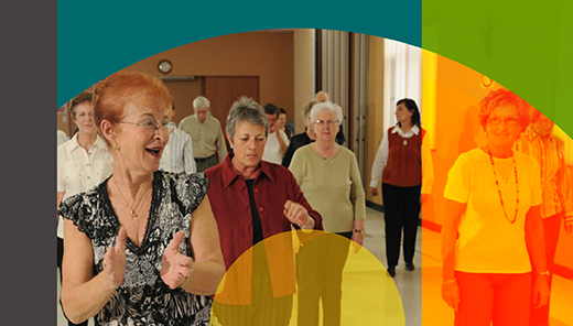 A group of older adults participating in an indoor activity or exercise session.