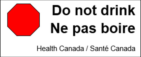 L'étiquette contient un octogone rouge avec la mention « Do not drink / Ne pas boire » suivi de « Health Canada / Santé Canada »
